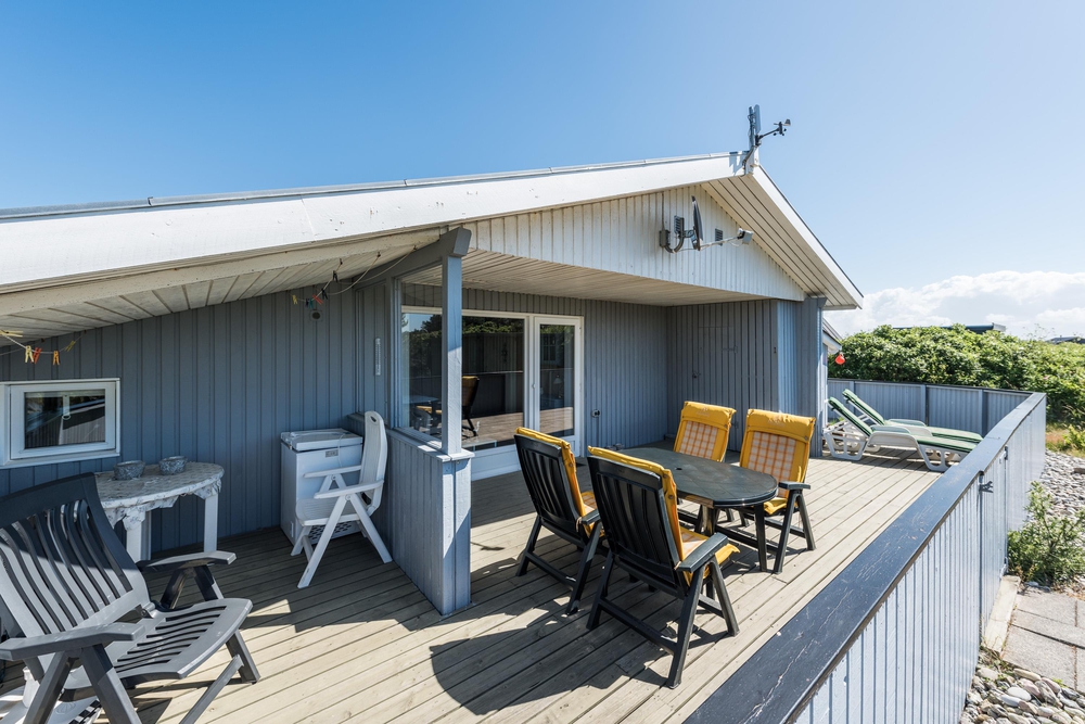 Ferienhaus mit geschlossener Terrasse und Kaminofen