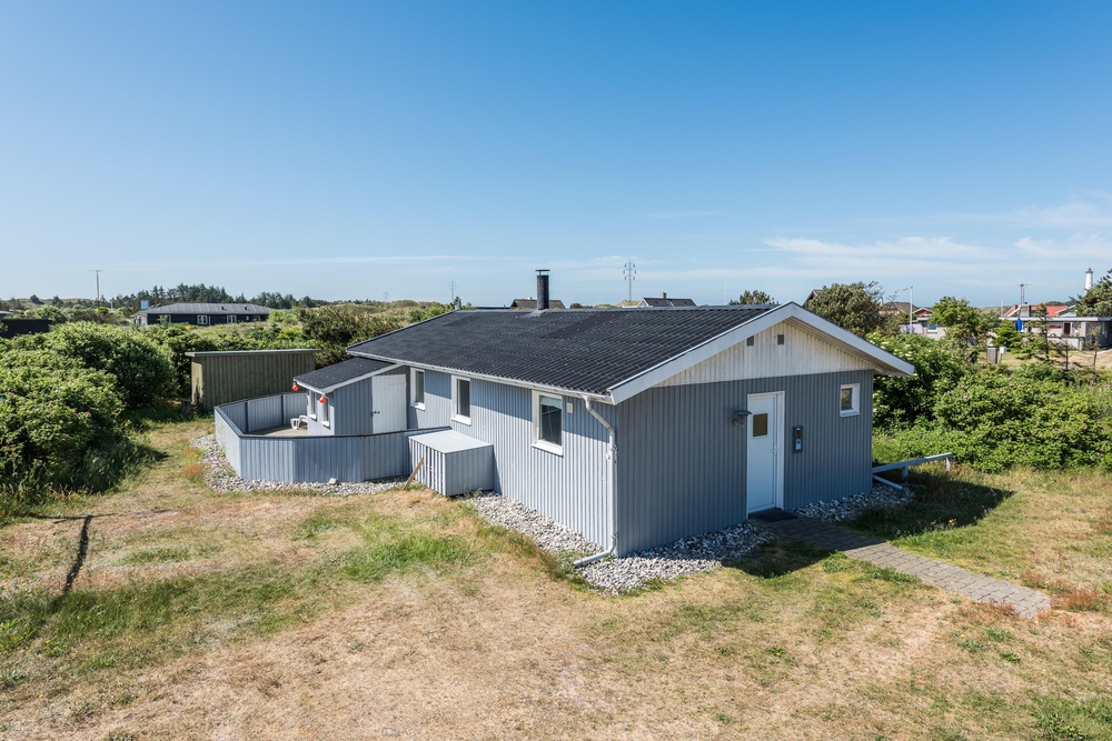 Ferienhaus mit geschlossener Terrasse und Kaminofen