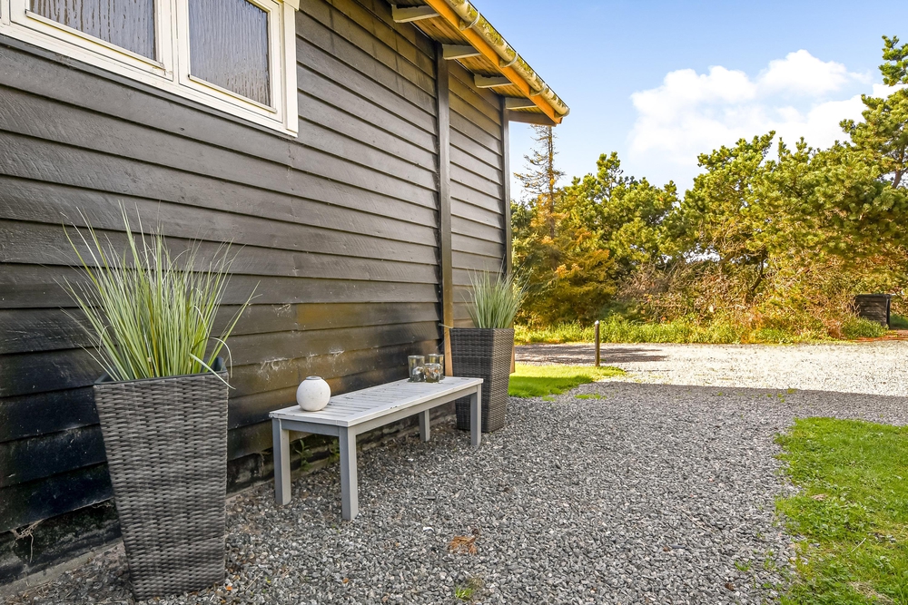 Gemütliches Holzhaus mit Kamin auf schönem Grundstück